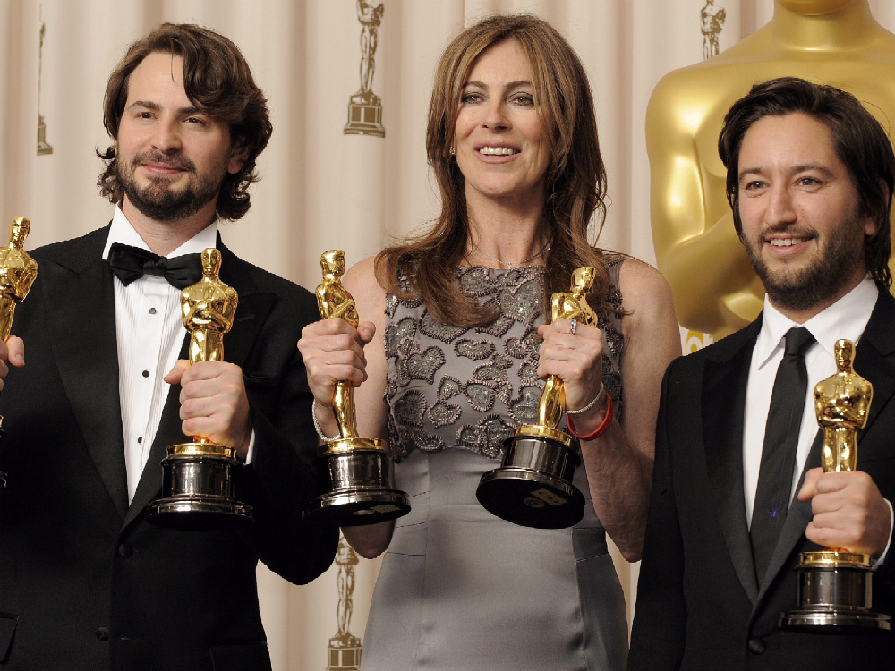 Il trionfo di «The Hurt Locker»: da sinistra lo sceneggiatore Mark Boal, la registaKathryn Bigelow e il produttore Greg Shapiro 